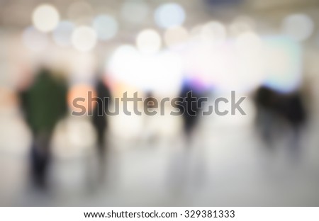 Generic interiors background with people. Intentionally blurred post production.