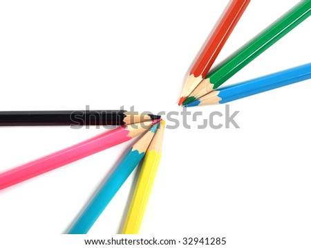 RGB and CMYK pencils over white