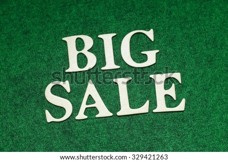 The Big Sale word on rusty green background. Business concept
