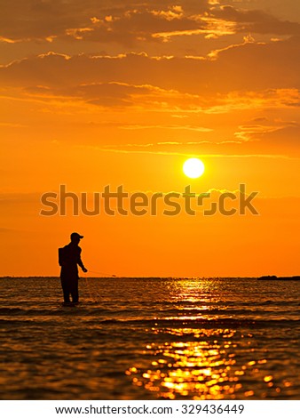 The fishermen atwork with sunset moments.