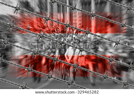 Austria flag, migrants and barb wire 