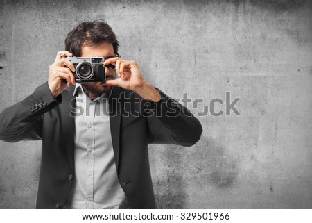 indian businessman taking a picture