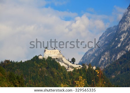 Majestic medieval Burg Hohenwerfen. The castle is situated on top of the mountain and surrounded by dense forest