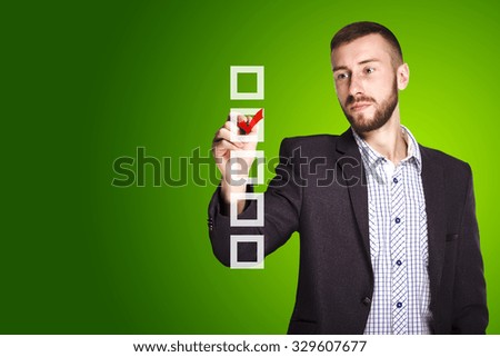 businessman drawing a tick