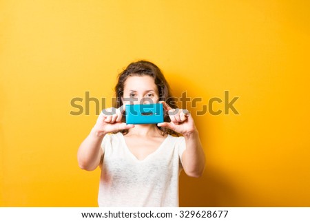 Girl photographing on phone