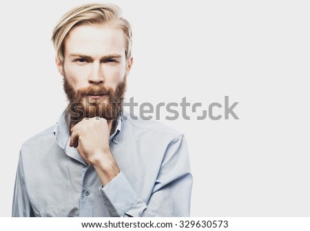 life style and people concept: young bearded man, casual style, close up. Isolated on white background.