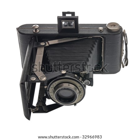An old medium format film camera isolated on white