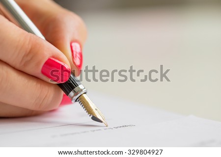 Woman signing contract 