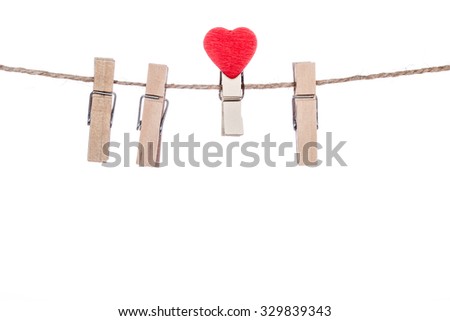 clothespins with heart  shape  clip on a clothesline, valentine romantic