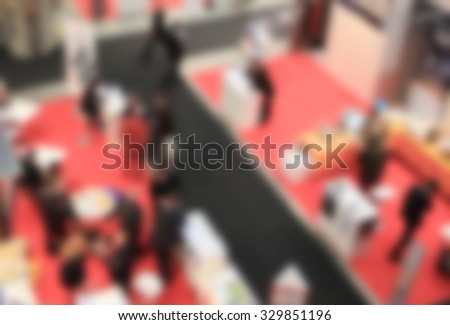 Motorcycle show, generic background. Intentionally blurred post production.