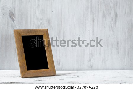 photo frame on old white table