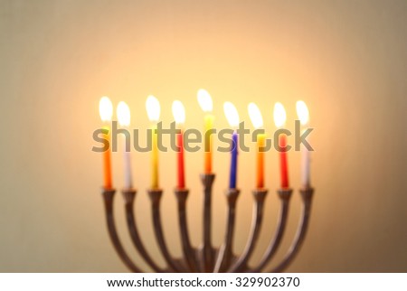 Image of jewish holiday Hanukkah background with menorah (traditional candelabra) Burning candles
