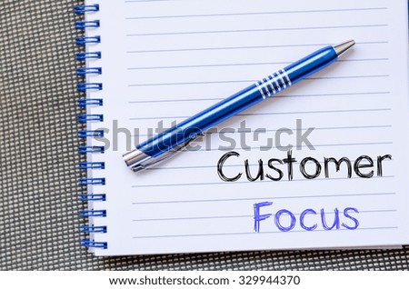 Customer focus text concept write on notebook