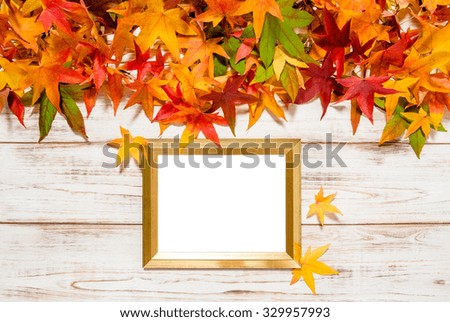 Autumn leaves and golden frame with space for your picture or text