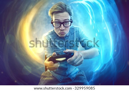 Nerdy gamer with controller Royalty-Free Stock Photo #329959085
