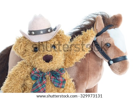 Cowboy Teddy bear and horses on white background