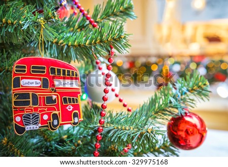 Christmas tree decoration with british london double decker red bus