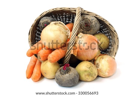Vegetables and a basket on a white background