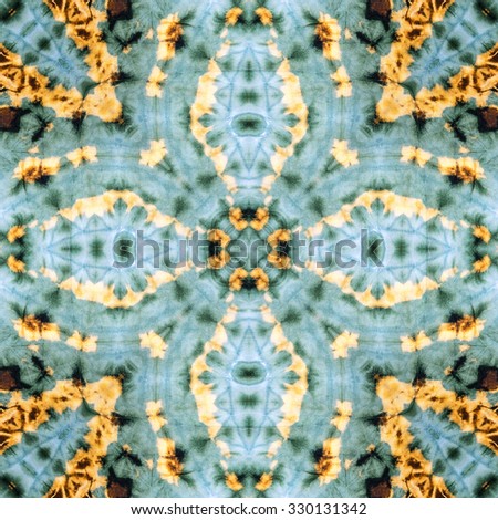 Abstract background pattern made from tie dye fabric.