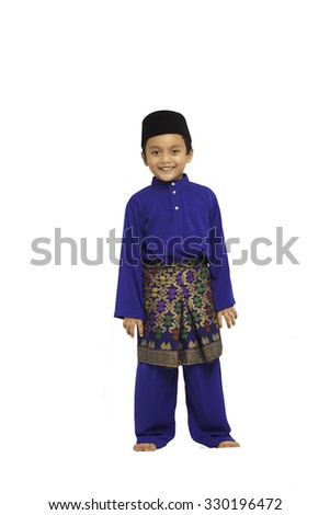 Portrait of beautiful little boy giving you thumbs up over white background