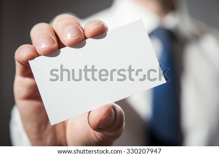 Man's hand showing visiting - closeup shot