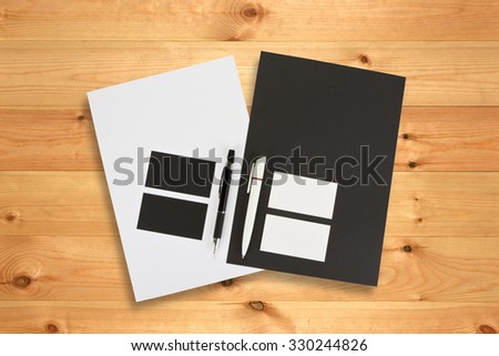 Blank stationery set for corporate identity system on wooden background