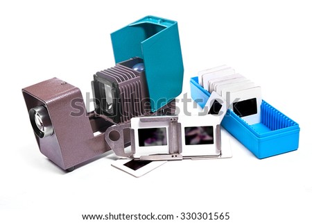 Vintage filmstrip projector and box with slide on the white background. Old projector for displaying of slides.