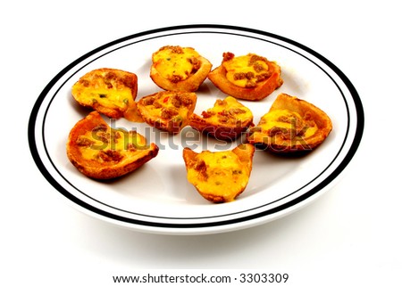 Stock pictures of potato skins loaded with chesse and bacon