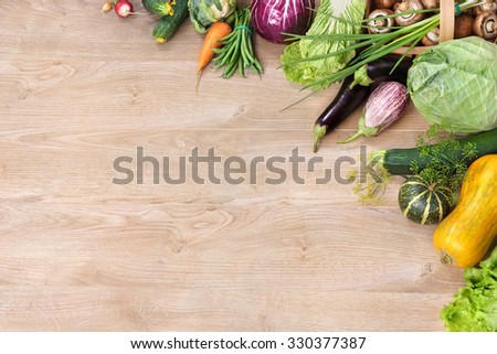 Organic foods background. Space for your text / high-res product, studio photography of different vegetables on old wooden table. high resolution product
