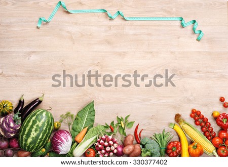 Only vegetables background / high resolution product, studio photo of different vegetables on wooden table. Space for your text.