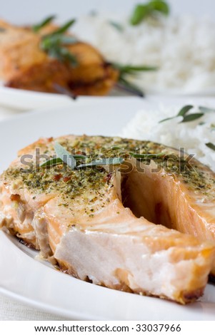 barbecue salmon steak on the white plate with rice