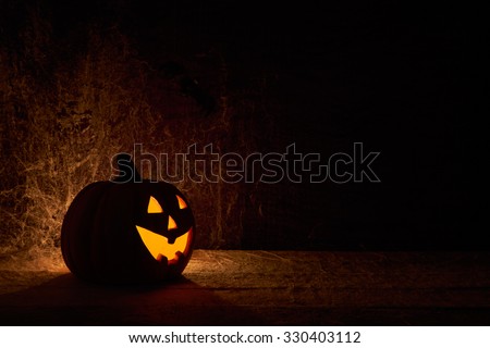 large Halloween jack o lantern Pumpkin with a dark background