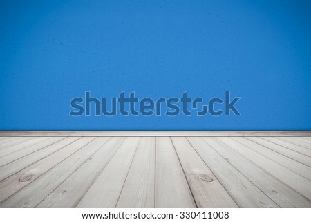 Cement Wall Painted Blue Color and Wood Floor Texture Background , room interior design
