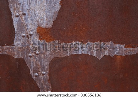 Colorful rust on the metal wall