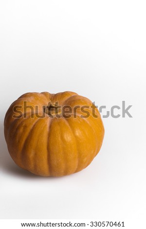 Organge Pumpkin on white background. Color studio Photography