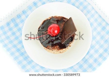 Cupcake with Cherries and Chocolate. Studio Photo.