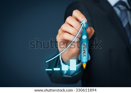 Startup in progress concept. Successful start-up with quick growing potential represented by spaceship.
 Royalty-Free Stock Photo #330611894