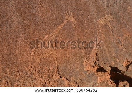 Bushman prehistoric rock engravings at the UNESCO World Heritage Center in Twyfelfontein, Namibia.