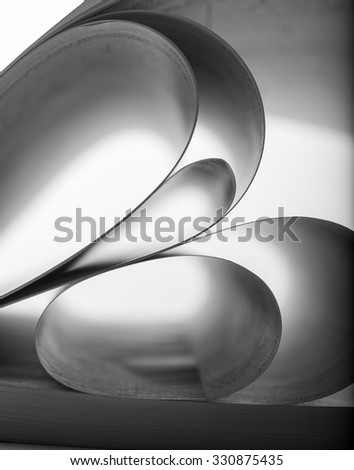 Macro view of abstract paper curves. B-W image