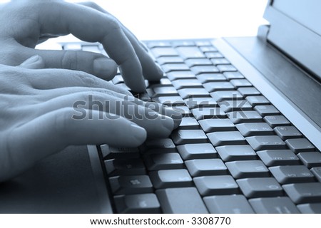 Female working with laptop special tint cyan Royalty-Free Stock Photo #3308770