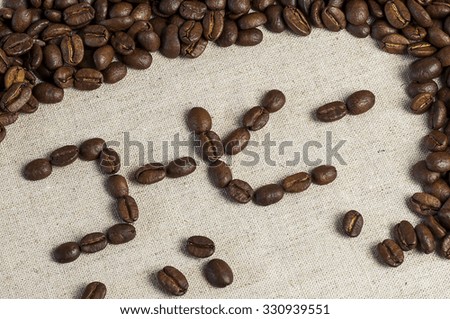 Coffee written in Japanese with coffee beans