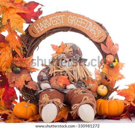 Autumn wreath with pumpkins and leaf border on a white background