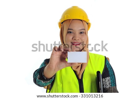 Young muslim female construction specialist smile while show a business card