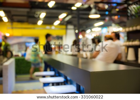 abstract blurred people in food and coffee shop 