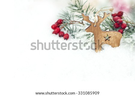 christmas background with wooden reindeer 