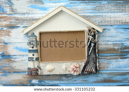Photo frame on wooden background - summer frame