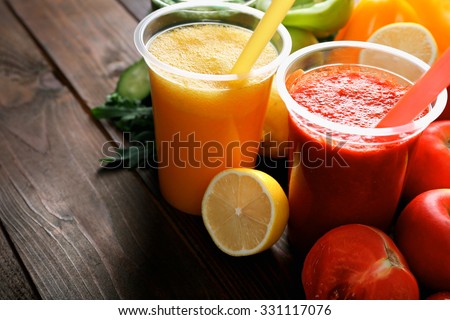 Fresh juice mix fruit, healthy drinks on wooden background Royalty-Free Stock Photo #331117076