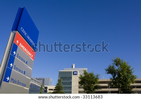 Modern hospital and sign