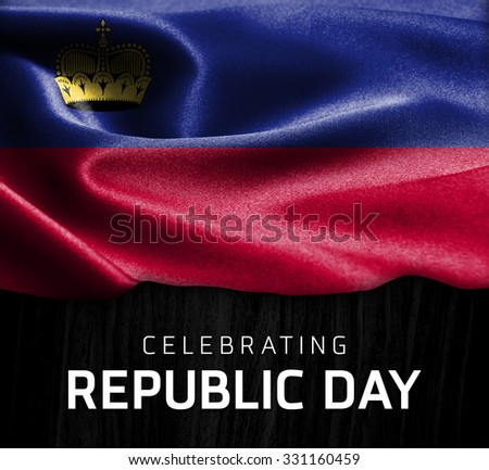 Liechtenstein flag and Celebrating Republic Day Typography on wood background