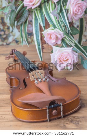 Violin and rose with vintage style